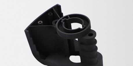 Creates a thin layer of magnetite on the surface of metal parts, giving them a black or dark gray appearance.